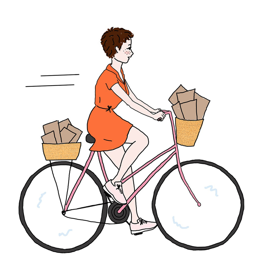 Dessin d'une jeune fille en robe à vélo. 