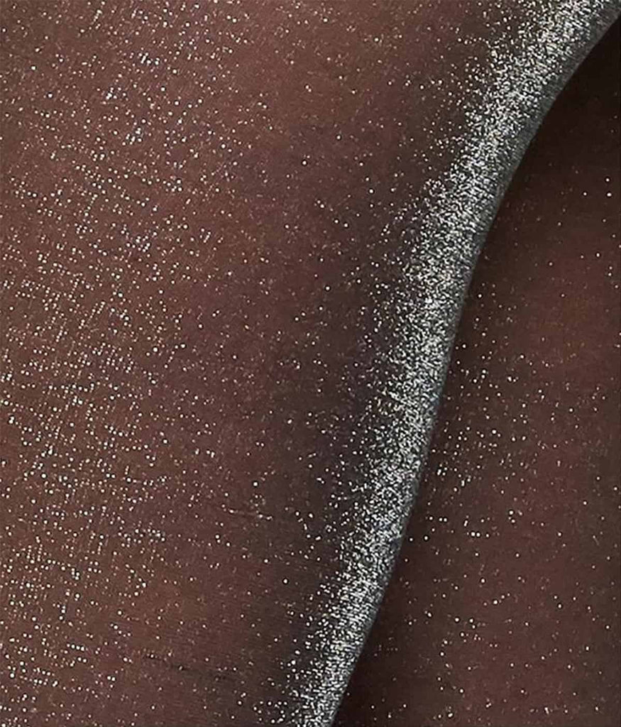 Collant pailleté et semi-transparent cousu à partir de fils recyclés de la marque éco-responsable Swedish Stockings.